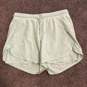 All in motion shorts, never worn, pockets and tie